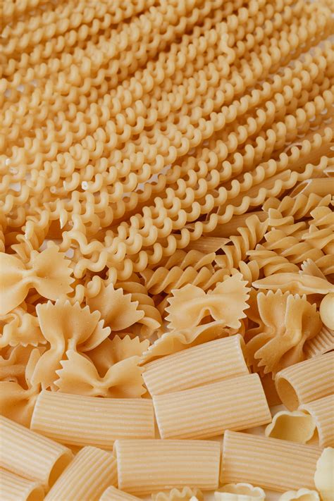 Close-Up Photo Of Uncooked Pasta · Free Stock Photo