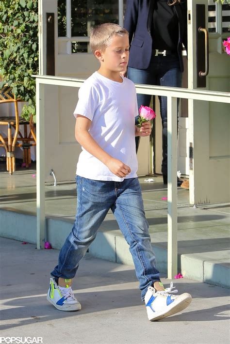 reese witherspoon s son deacon held onto a rose reese witherspoon accessorizes with a sippy