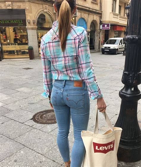 image may contain one or more people people standing and outdoor levi jeans women girls