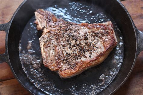 Season the steak heavily with salt and pepper on all sides. E.A.T.: Iron-Skillet Steak with Thyme Butter