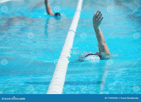 Women Swimming Backstroke In A Race Stock Photo Image Of Splashing