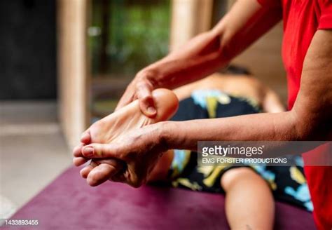 Mature Woman Foot Massage Photos And Premium High Res Pictures Getty Images