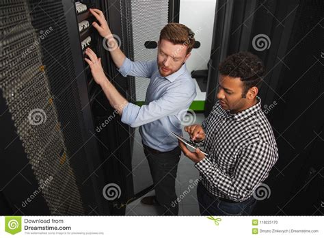 Concentrated Two Colleagues Discussing Problem Stock Photo Image Of