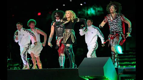 madonna exposes fan s breast onstage during concert cnn