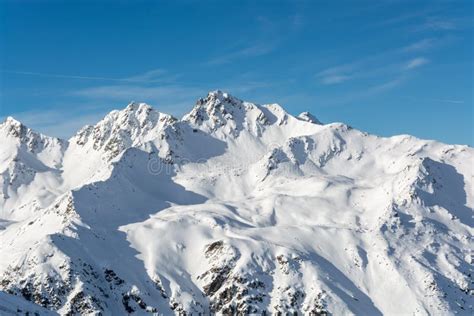 Snowy Mountains In The Austrian Alps With Blue Sky Stock Image Image