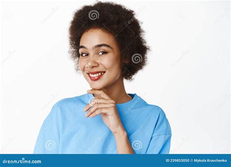 Beauty An Skincare Close Up Portrait Of Beautiful Happy African American Woman Touching