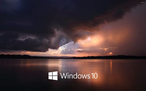 Windows 10 White Text Logo Over The Stormy Sea Wallpaper Computer