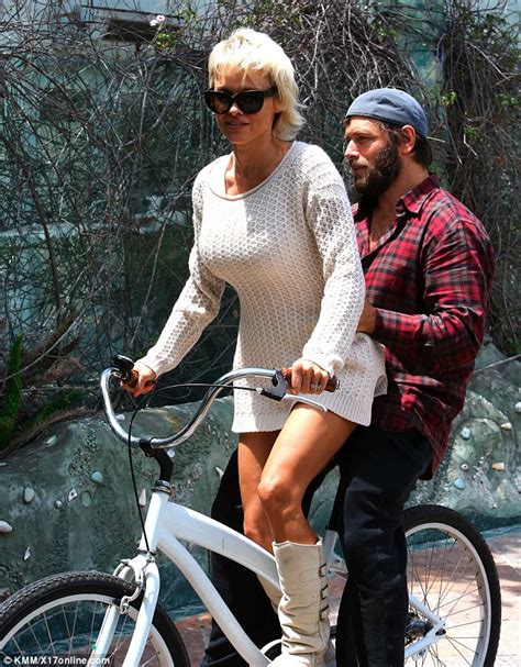 Pamela Anderson And Rick Salomon Enjoy A Couples Bike Ride In Malibu
