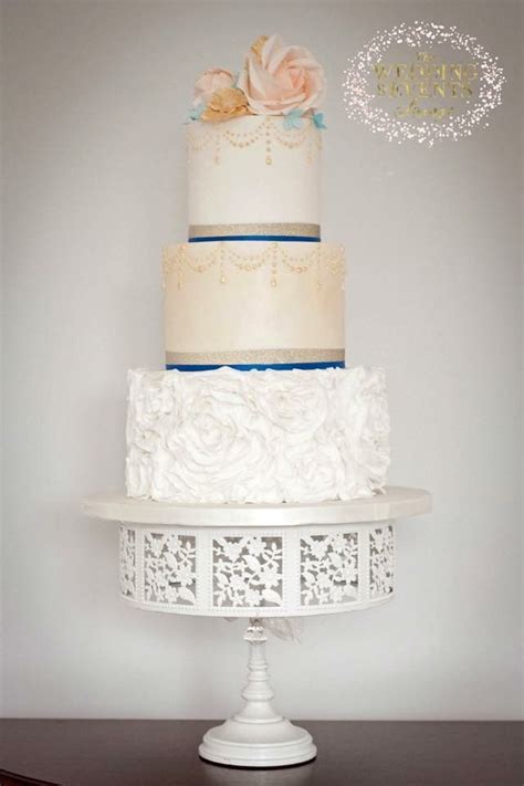 Tall Gold Blue And Peach Wedding Cake With Ruffles And Roses 3 Tier