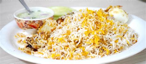 Special Kolkata Chicken Biryani Served With Raita 10710103 Stock Photo