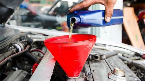 Person Pouring Oil Into Car Car Mechanic Auto Repair Pouring Oils