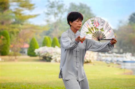 People Practice Tai Chi Chuan In A Park Editorial Photo Image Of Exercising Leisure