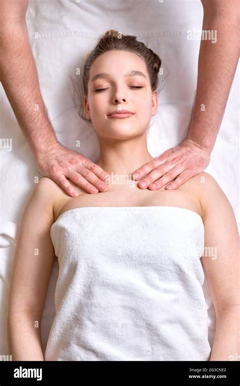 Relaxing Massage Top View Female Receiving Shoulders And Neck Massage At Spa Salon Female