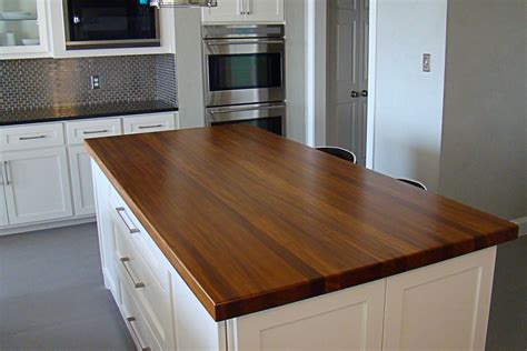 The popularity of wood countertops has endured the changing times and trends as new countertop materials have been introduced over the decades. Afromosia Wood Countertop Photo Gallery, by DeVos Custom ...