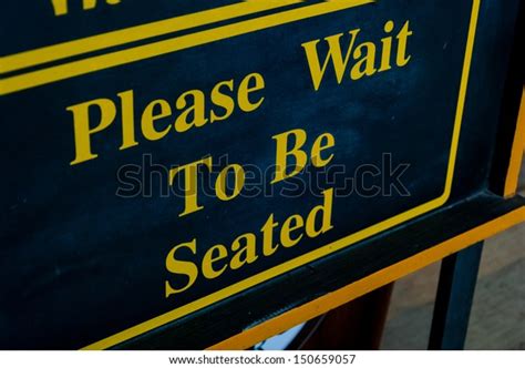 Please Wait Be Seated Sign Stock Photo Edit Now 150659057