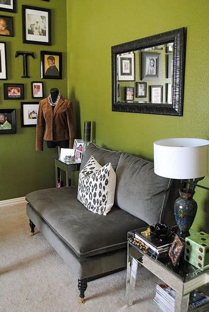 The most common olive green and gray material is cotton. little grey couch, olive green walls, and wall of frames ...