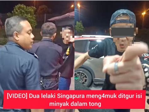 Video Dua Lelaki Singapura Meng Muk Ditgur Isi Minyak Dalam Tong