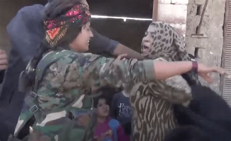 watch woman freed from isis control in raqqa celebrates by ripping off mandated clothing redstate