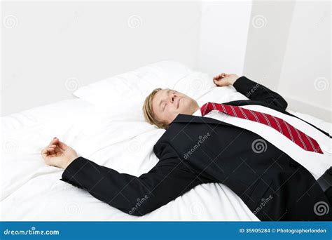 Mid Adult Businessman Sleeping In Bed At Home Stock Images Image