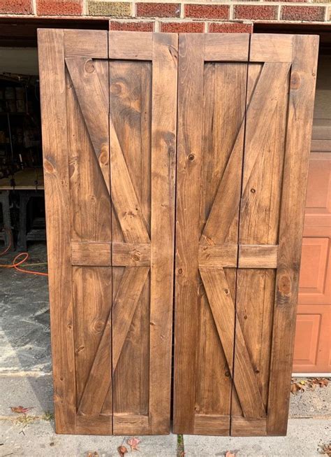 A blog dedicated to diy decorating and home improvement. Bi-fold barn door | Bifold barn doors, Diy barn door, Sliding barn door hardware