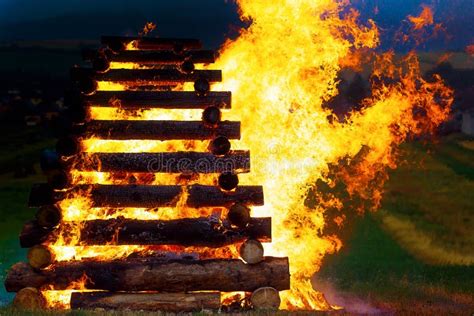 Great Burning Bonfire Made Of Logs With Beautiful Flames Stock Photo