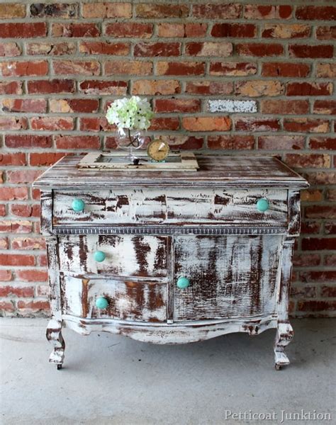 Stencils are another option for painting furniture. Turquoise Knobs And A Distressed Shabby White Dresser ...