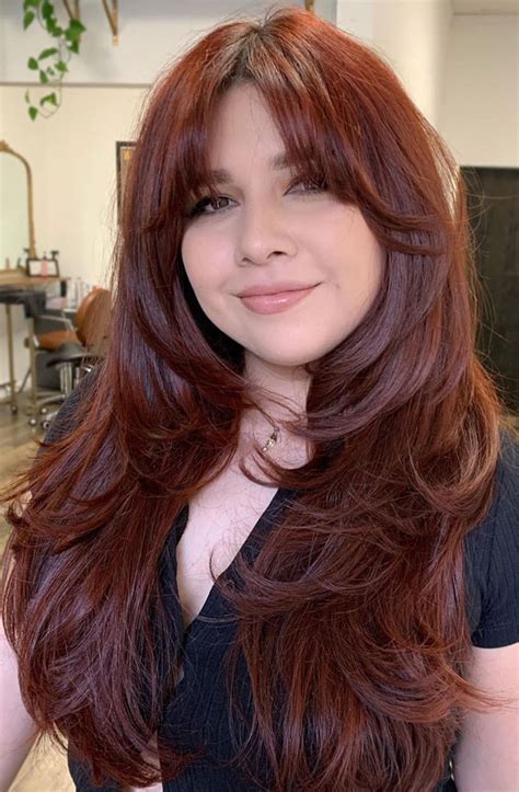 Copper Hair Color Ideas That Re Perfect For Fall Cinnamon Copper Wispy Bangs Layered Cut