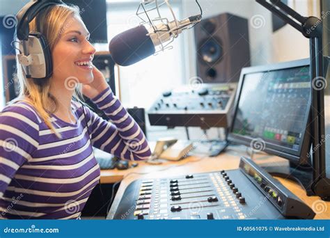 Radio Host Broadcasting A Show In Studio Royalty Free Stock Photo