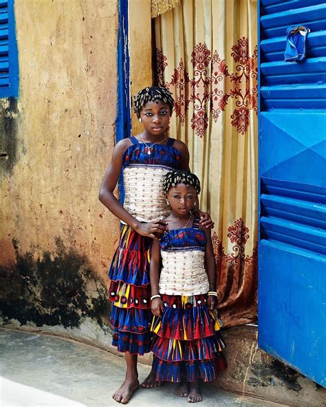 Two Girls All Dressed Up For Tabaski Pose For A Portrait Bobo