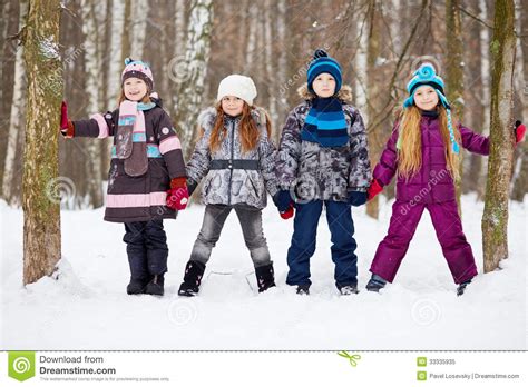 Now you should consider 2 girls into one unit. Three Girls And Boy Stand Holding Hands In Winter Park ...