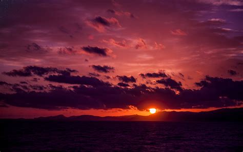 Download Wallpaper 3840x2400 Sea Clouds Mountains Sunset Dark 4k