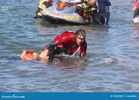 Lifeguard Saves Swimmer Rescue At Sea Editorial Photography Image Of Swimmers Livorno 78023982