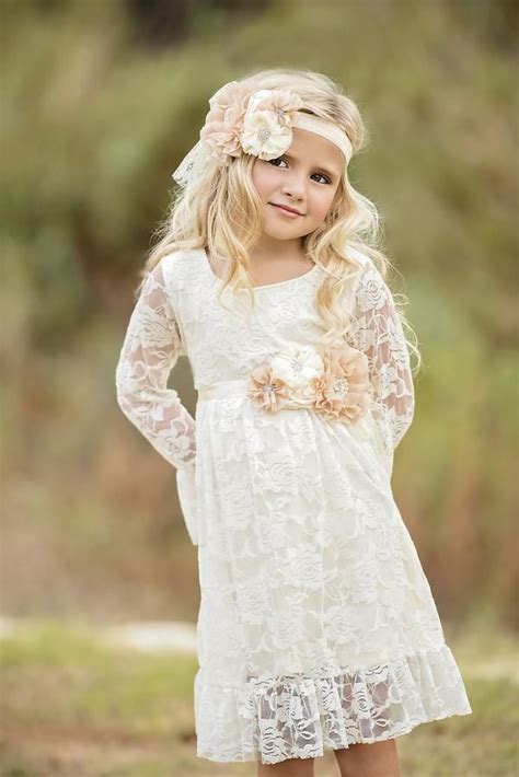 This Vintage Ivory Lace Dress Features Ruffle Sleeves And Hem That Is