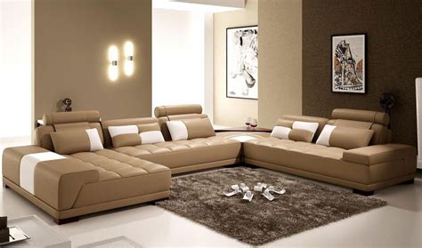 The Interior Of A Living Room In Brown Color Features