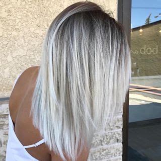The blond hair of 2019 focuses on platinum, lunar, icy shades. Icy Blonde Hair Dark Roots Short Hairstyles in 2020 ...