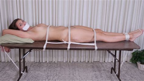 Gorgeous Naked Amazon Bella Rolland Is Tied Down To A Table Gagged On