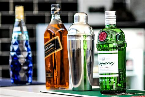 Four Different Alcoholic Bottles · Free Stock Photo