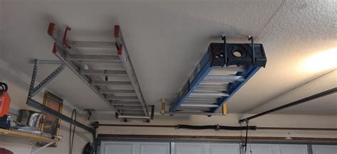 Ladder Storage On Ceiling Above Garage Door Ladder Storage Diy