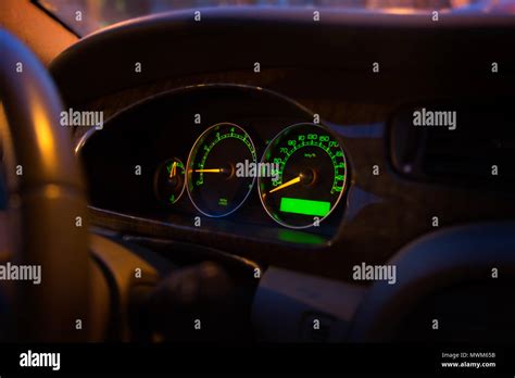 Modern Illuminated Green Car Control Panel Dashboard Display Stock