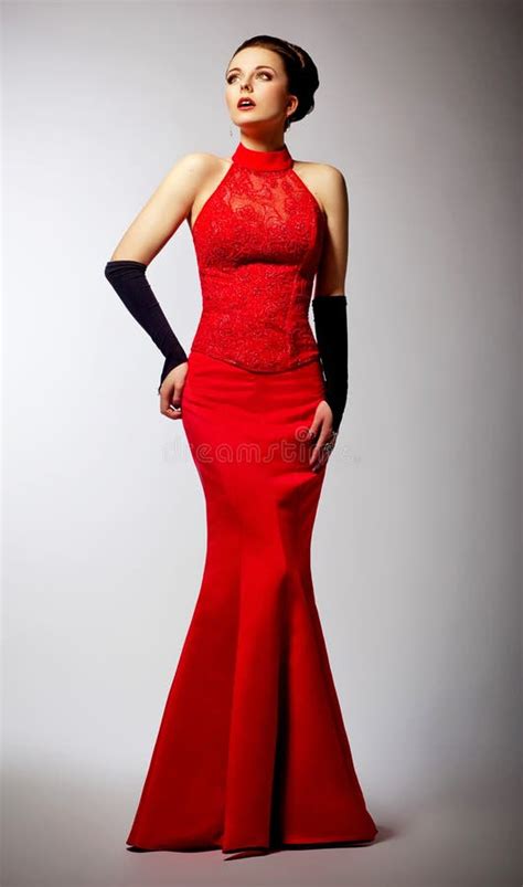 Woman In Black Gloves And Wedding Red Dress Posing Stock Photo Image