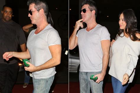 simon cowell looks more booby than mooby as he sparks chest implant rumours daily star