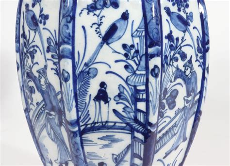 Dutch Delft Blue And White Chinoiserie Garniture Of Vases Bada