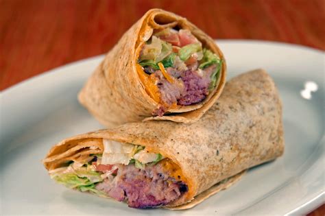 Place the roast over the onions in the crock pot. Carolina Pork Wrap. Sun-dried tomato wrap stuffed with our ...
