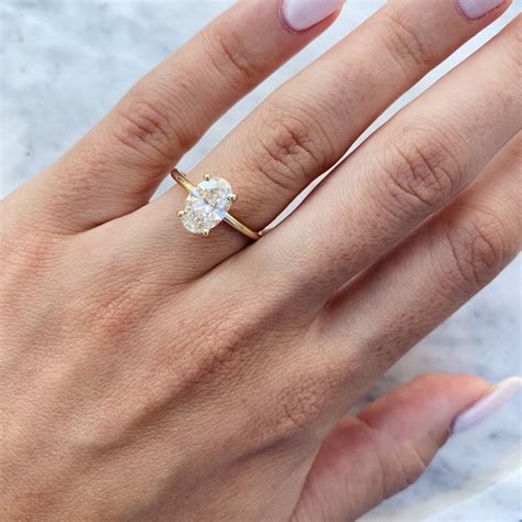 1 50 Carat Oval Diamond Engagement Ring 14K Yellow Gold Etsy
