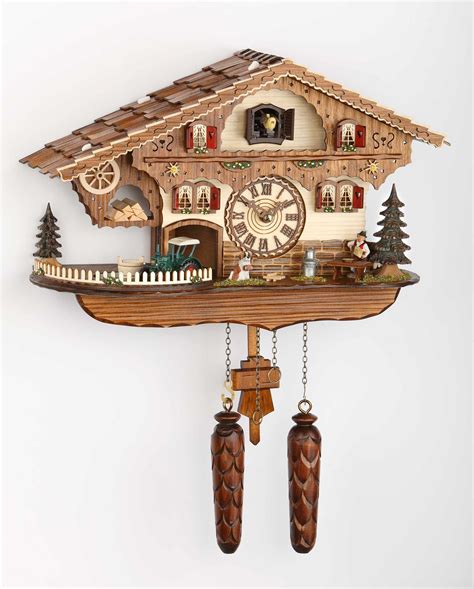 Chalet Style Quartz Cuckoo Clock With Accordion Player And Cuckoo 27cm