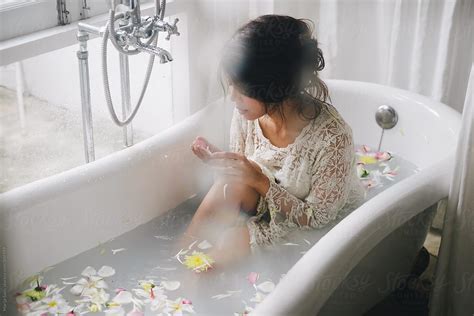 Woman Enjoying Bathtub By Stocksy Contributor Marija Savic Stocksy