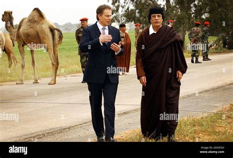 prime minister tony blair l and libyan leader colonel muammar gaddafi during an hour long