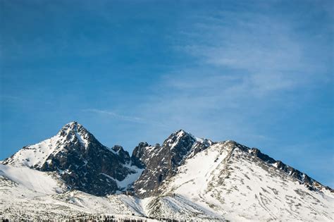 Photo Of Snow Capped Mountains During Daytime · Free Stock Photo