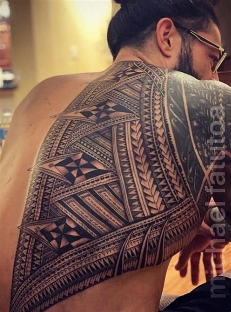 No real reason was given for the shift except that the challenger just couldn't wait that long to get his hands on the champion. New Photo Drops Of Roman Reigns' Latest Back Tattoo ...