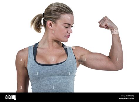 Serious Muscular Woman Flexing Muscle Stock Photo Alamy